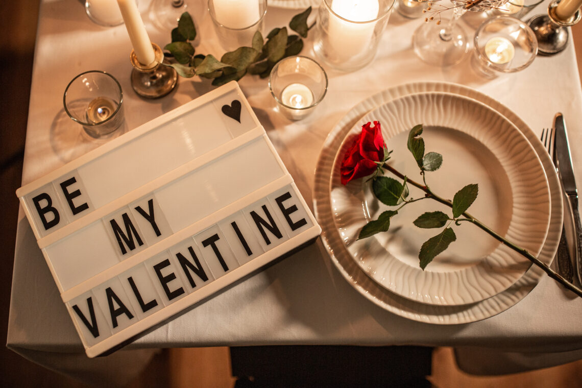 A beautifully set dinner table for Valentine’s Day.